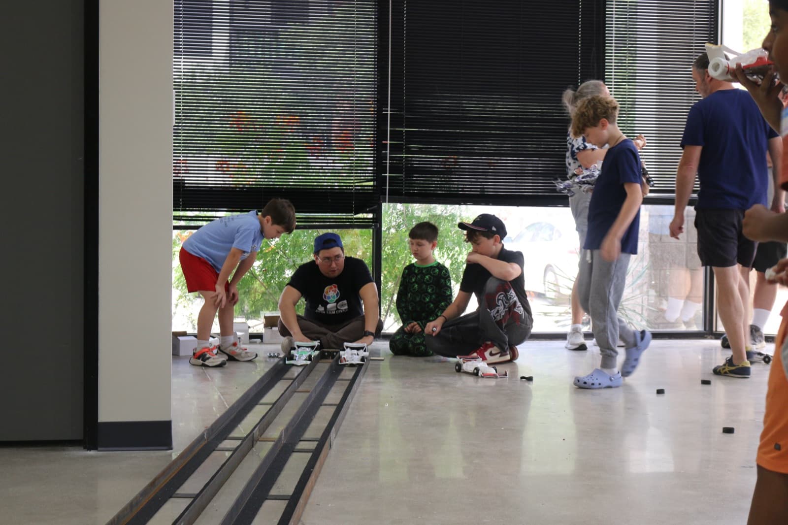 Campers lining their cars up on the track on race day